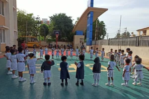 Montessori children participating in Circle Time at BRS Global School Attibele, one of the leading schools in Chandapura.