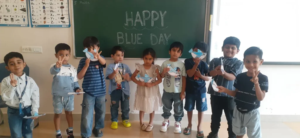Montessori students celebrating Blue Day at BRS Global School Attibele, one of the trusted schools in Anekal.