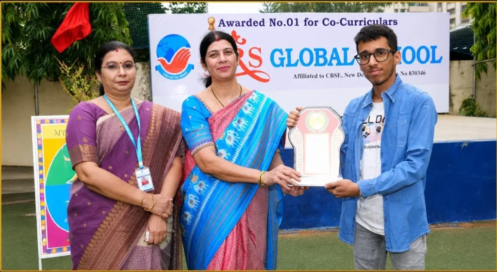 Distinguished alumnus Mr. Siddharth Theckyam Saravanan being honoured during the Investiture Ceremony at BRS Global School, one of the best CBSE schools in Sarjapur Road, Bangalore.