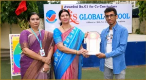 Distinguished alumnus Mr. Siddharth Theckyam Saravanan being honoured during the Investiture Ceremony at BRS Global School, one of the best CBSE schools in Sarjapur Road, Bangalore.
