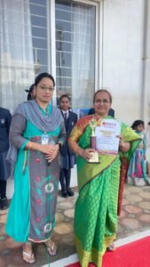 BRS Global School Principal receiving BSSCA Certificate of Honour at schools in Attibele