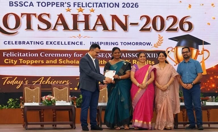 BRS Global School Principal receiving the BSSCA Topper’s certificate at Alliance University, with families from CBSE schools in Chandapura.
