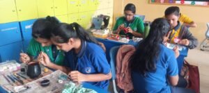 Students developing life skills through collaborative learning at BRS Global School in schools in Attibele