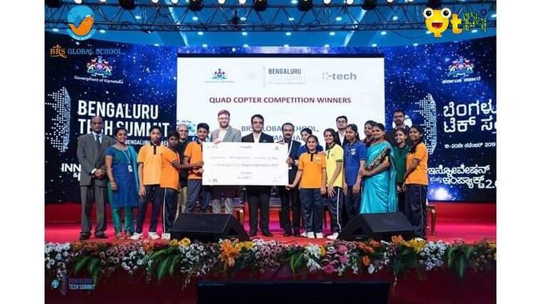 BRS Global School students receiving drone competition awards at the Bengaluru Tech Summit