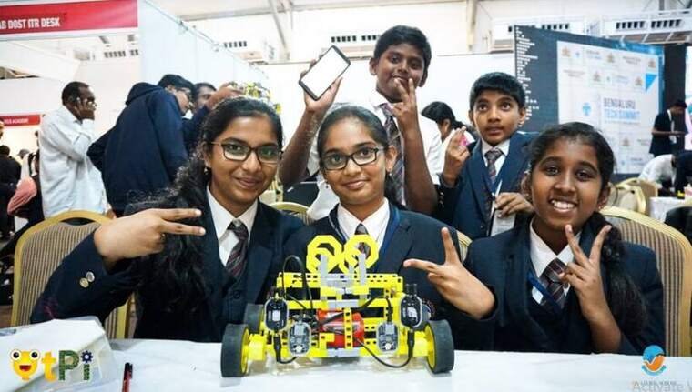 BRS Global School students with the robotic car they built and programmed