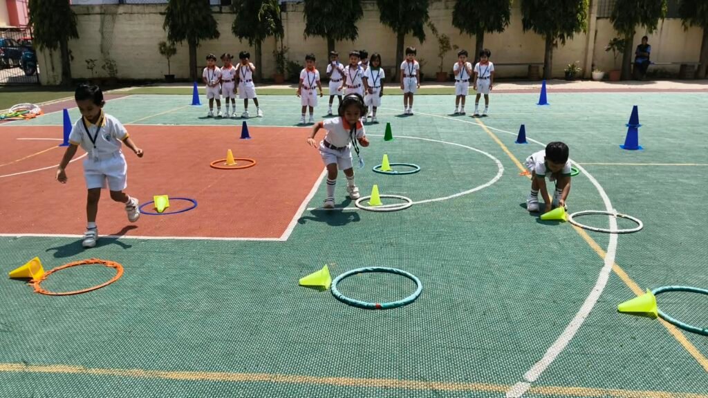 Montessori students enjoying an age-appropriate physical training session in Bengaluru