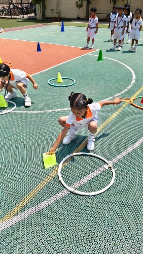Montessori students enjoying an age-appropriate physical training session in Bengaluru